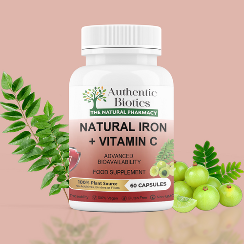 A bottle of Authentic Biotics Natural Iron + Vitamin C with a label showing a tree and leaves, indicating it's a plant-based supplement. There are 60 capsules mentioned, and it's labeled as vegan and gluten-free.